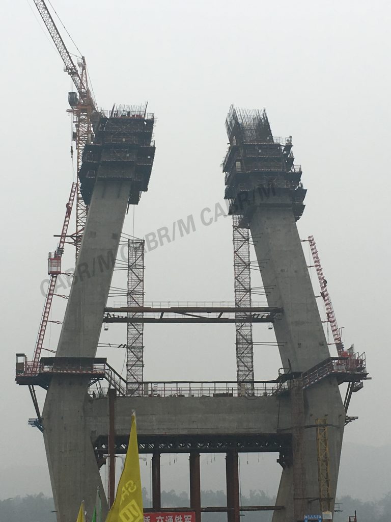 Curved and inclined construction hoist